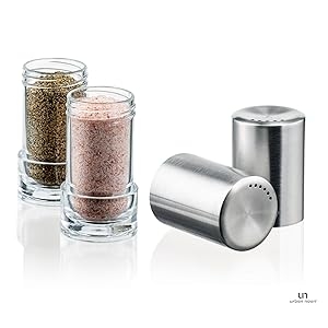 demonstration of premium salt and pepper shakers two unique lids with differently sized holes